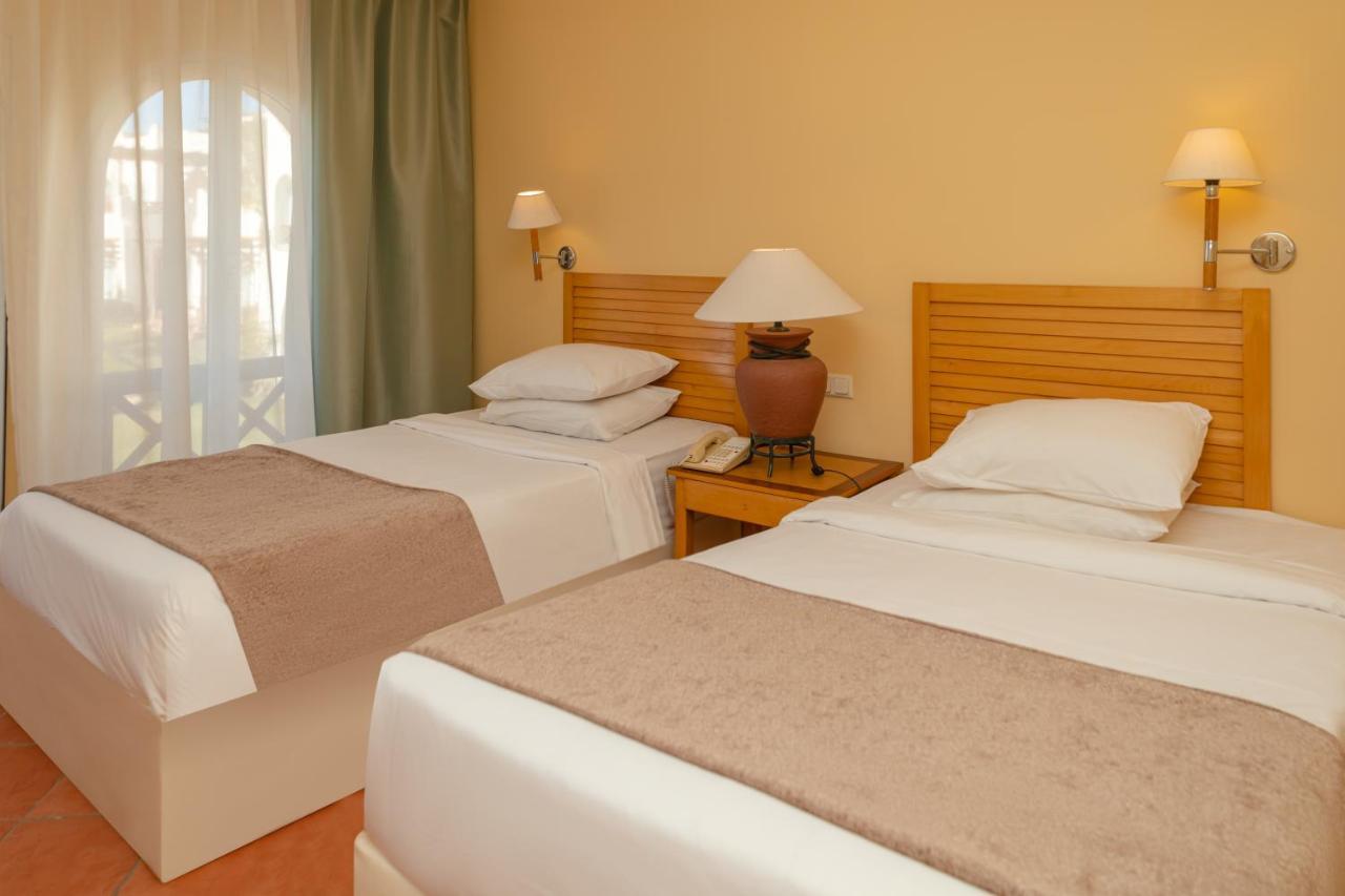Hotel Sharm Dreams Vacation Club - Aqua Park Exterior foto A bedroom